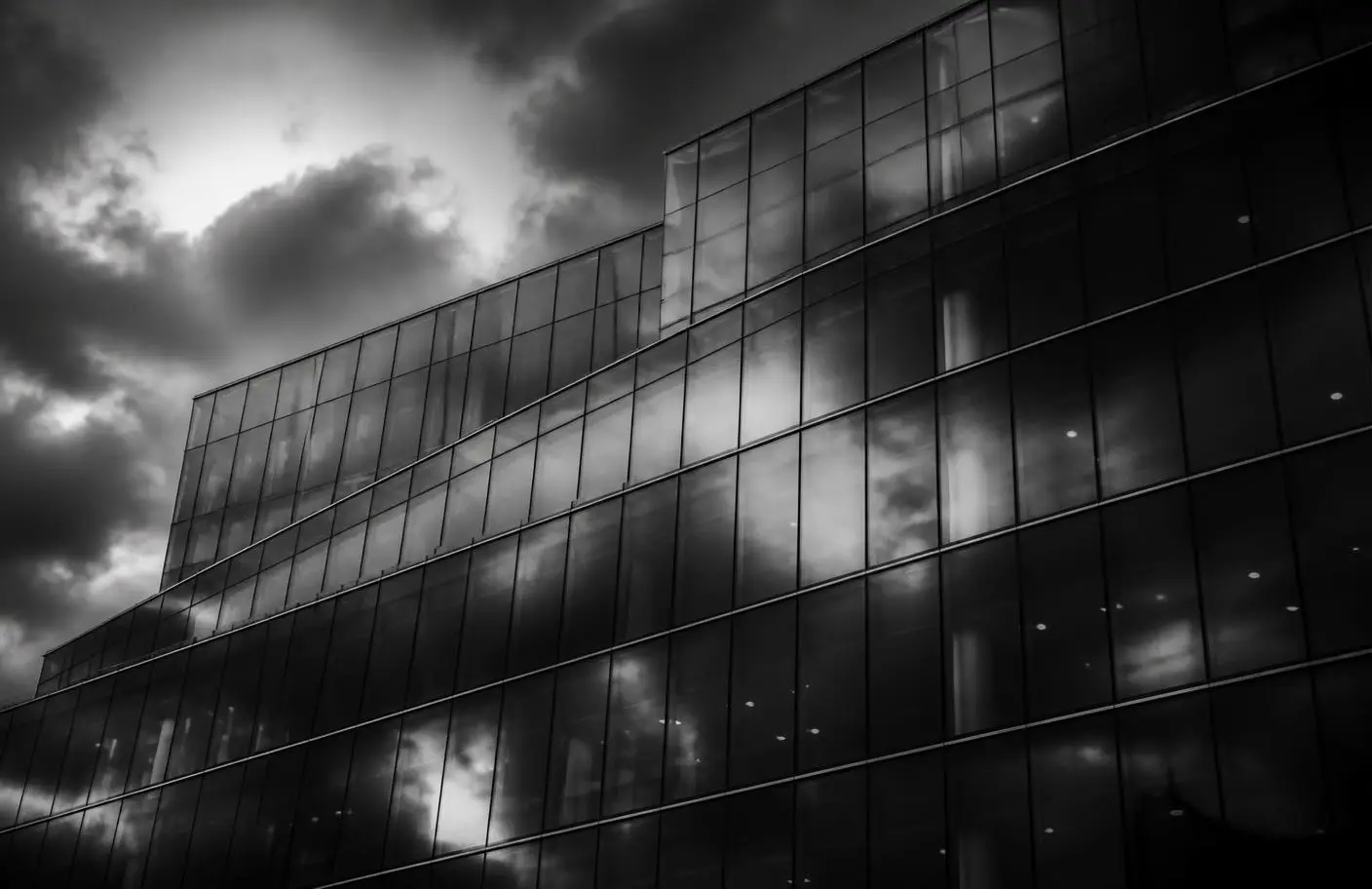 Office interior with floor-to-ceiling glass finished with architectural window film
