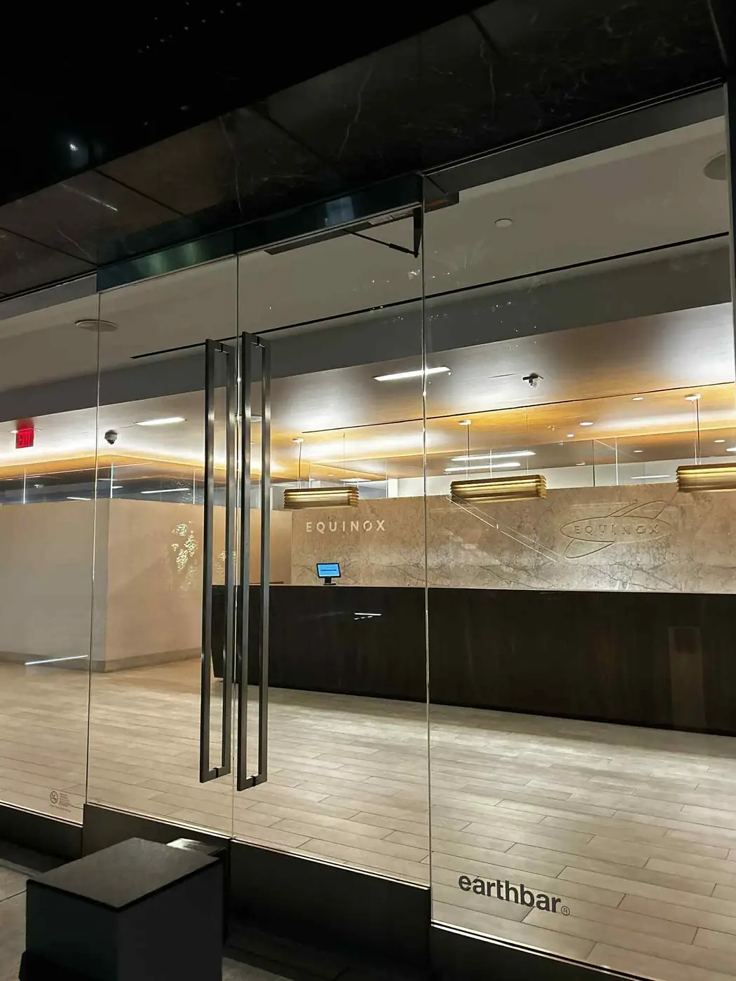 Commercial storefront glass with security film applied