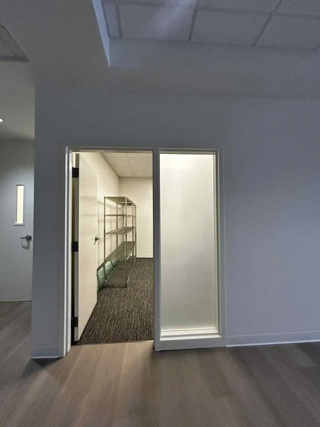 Clear glass office partition before film